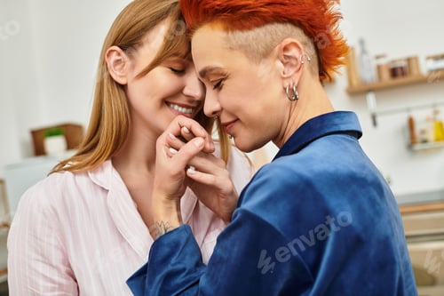 Preview: Young couple shares a tender moment in their stylish apartment