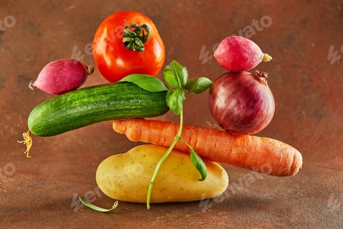 Preview: A gourmet food composition with colorful vegetables on a brown background,