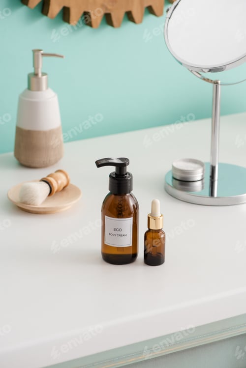 Preview: Selective focus of eco body cream and cosmetic oil and hygiene objects in bathroom, zero waste