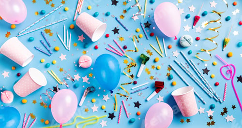 Preview: Birthday party flat lay banner. Birthday decorations on blue background top view