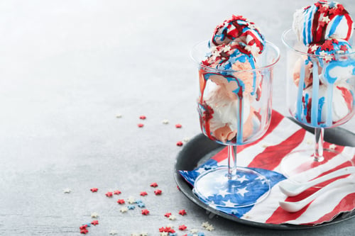 Preview: 4th of July American Independence Day food or drink. Crazy milkshake with strawberry and vanilla ice