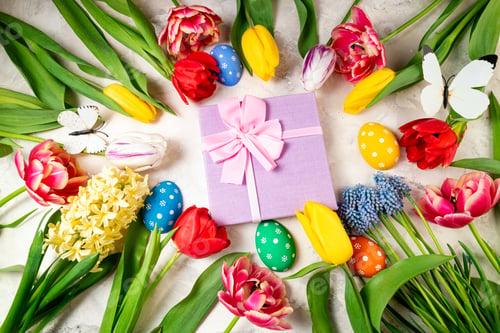 Preview: Spring background with flowers, Easter eggs and gift box. Tulips spring flowers