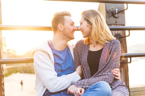 Preview: Joyful caucasian couple enjoying sunset together