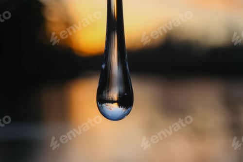 Preview: Soft focus of a water droplet with reflection of the sky