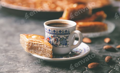 Preview: A cup of Turkish coffee and baklava. Selective focus.