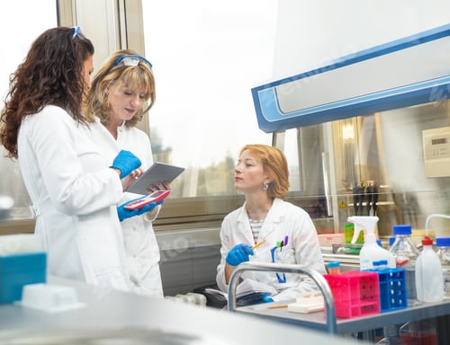 Preview: Photo of real female scientists researching in laboratory.