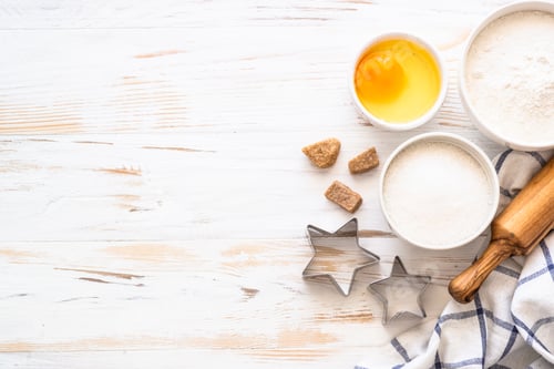 Preview: Baking ingredients at white wooden table