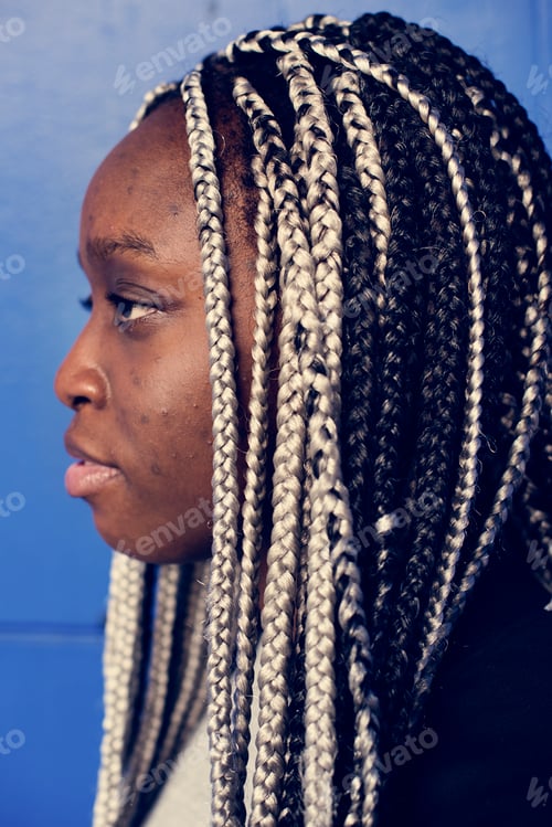 Preview: Portrait of black woman with dreadlocks hair