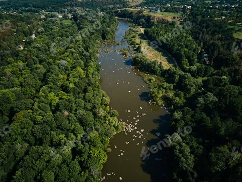 Preview: Aerial view of Southern Bug river and granite mountains, summer landscape