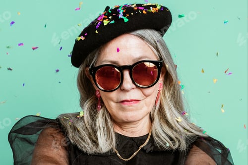 Preview: Cool grandma with an attitude in a beret and sunglasses