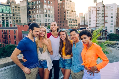 Preview: Group of friends having party on a rooftop