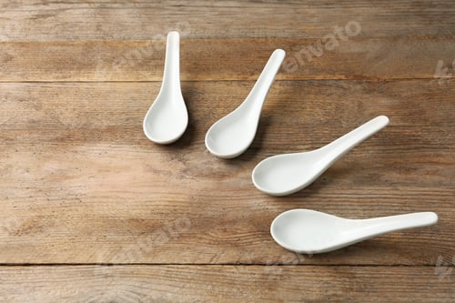 Preview: Miso soup spoons on wooden table. Space for text