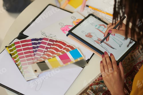 Preview: Female Designer Drawing Fashion Illustration