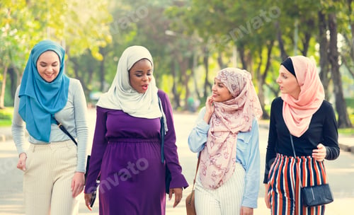 Preview: Islamic women friends walking and discussing together