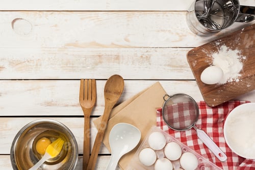 Preview: baking preparation, top view of a variety of baking utensils and ingredients