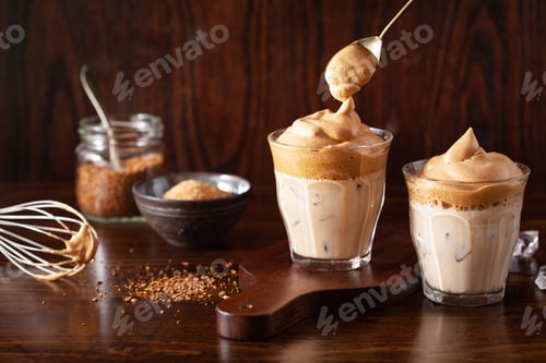 Preview: dalgona coffee in glass. trendy Instant coffee whipped with sugar and hot water