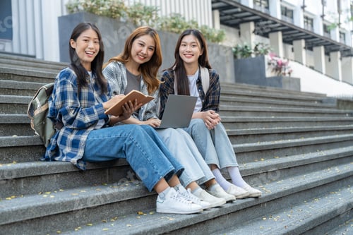 Preview: A group of young Asian female students who enjoy searching for scientific information on the field m