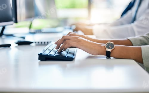 Preview: Hands, keyboard and typing with a business woman working on a computer at her desk in the office. F