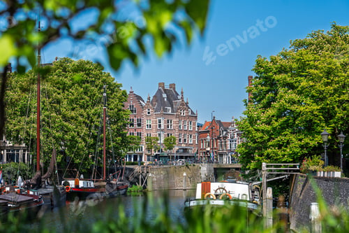 Preview: Scenic Rotterdam Canal View Historic Dutch Architecture and Boats on the Waterway landscape