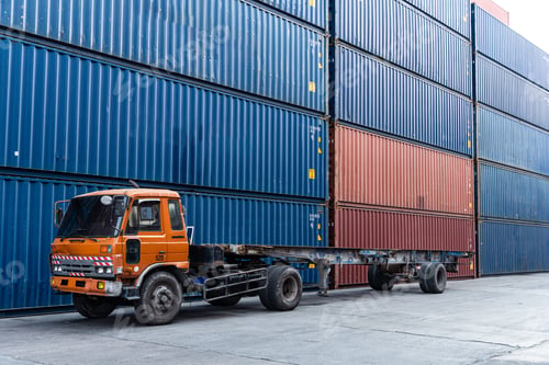 Preview: Background of truck at container warehouse preparing to lift cargo boxes