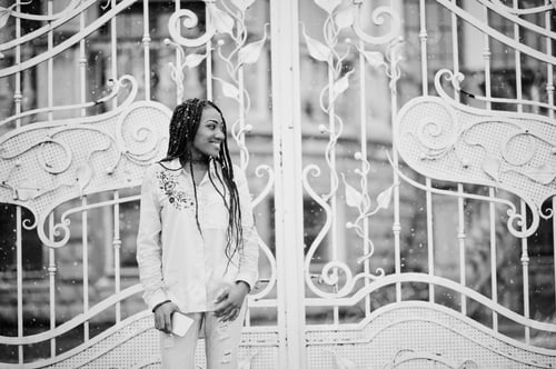 Preview: Stylish african american girl with dreads