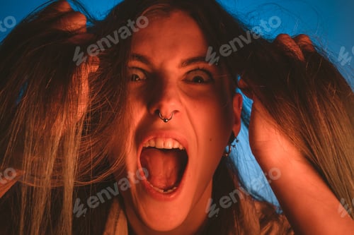 Preview: Attractive woman touching her hair