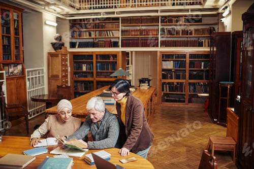 Preview: People Studying in Library