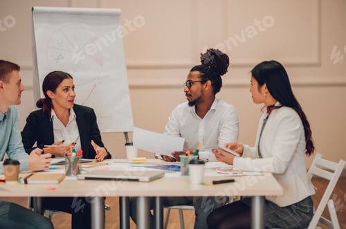 Preview: Multiracial business team having a meeting in office