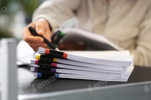 Preview: Businesswoman working with documents at grey table in office, closeup