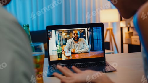 Preview: Young Asia female drinking beer having fun happy moment night party event online.