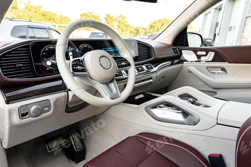 Preview: Modern luxury car interior with steering wheel, multimedia and dashboard