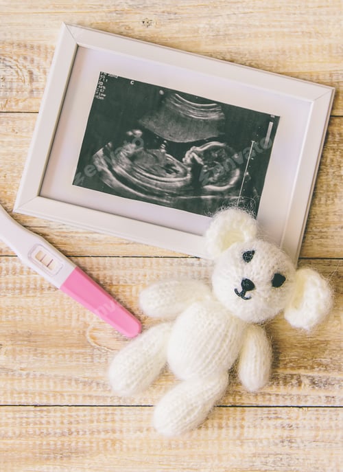 Positive Pregnancy Test with Ultrasound Photo and Teddy