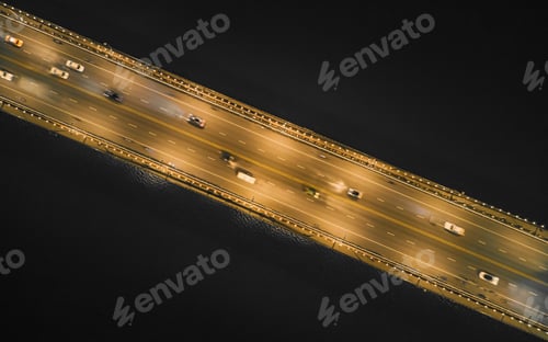 Preview: Aerial view of a bridge with cars driving at night in Liuzhou, Guangxi, China, Asia