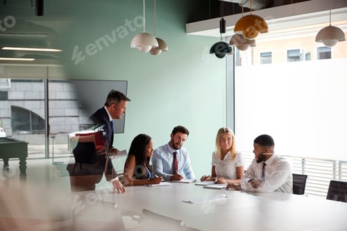 Preview: Group Meeting Around Table At Graduate Recruitment Assessment Day