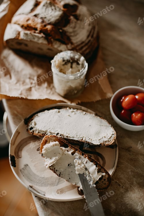 Preview: Rustic Bread Topped with Creamy Spread and Tomatoes
