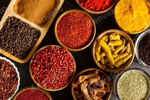 Preview: various spices on black background