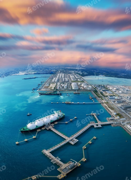 Preview: LNG (Liquified Natural Gas) tanker anchored in Gas terminal gas tanks for storage. Oil Crude Gas