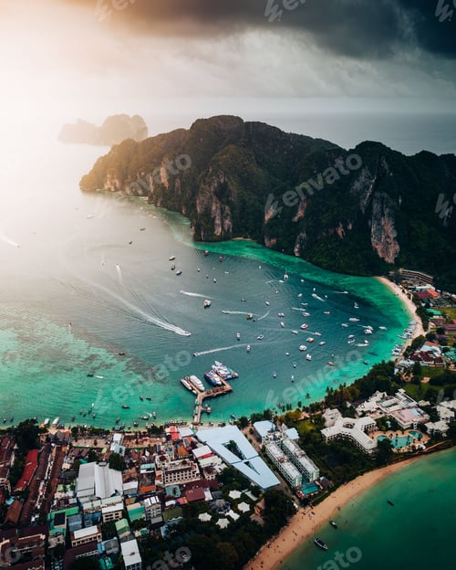 Preview: Aerial view of a forested green rocky island with a sandy beach in Thailand, Krabi, Phi Phi Island