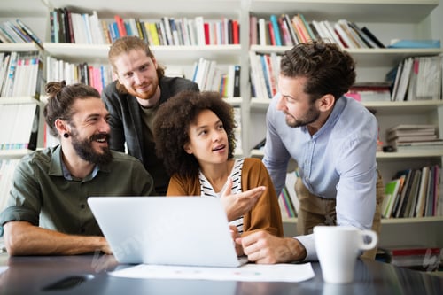 Preview: Programmers cooperating at IT company developing apps