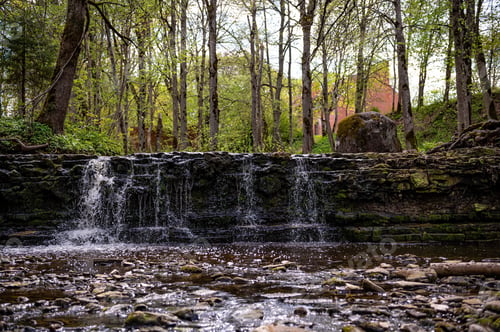 Preview: beautiful view in spring of a waterfall on small river Ivande in Latvia