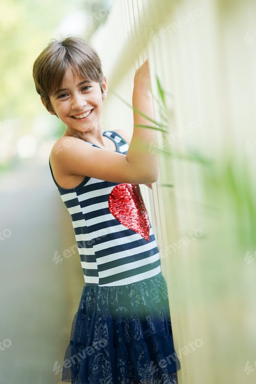 Preview: Little girl, eight years old, having fun outdoors