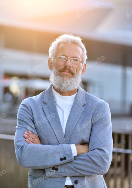 Preview: Confident mature older business man outdoor vertical portrait.