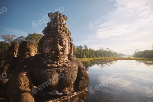 Preview: Faces of statues along road to Angkor Thom Temple in Cambodia