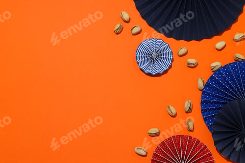Preview: Pistachios with umbrellas on a light background