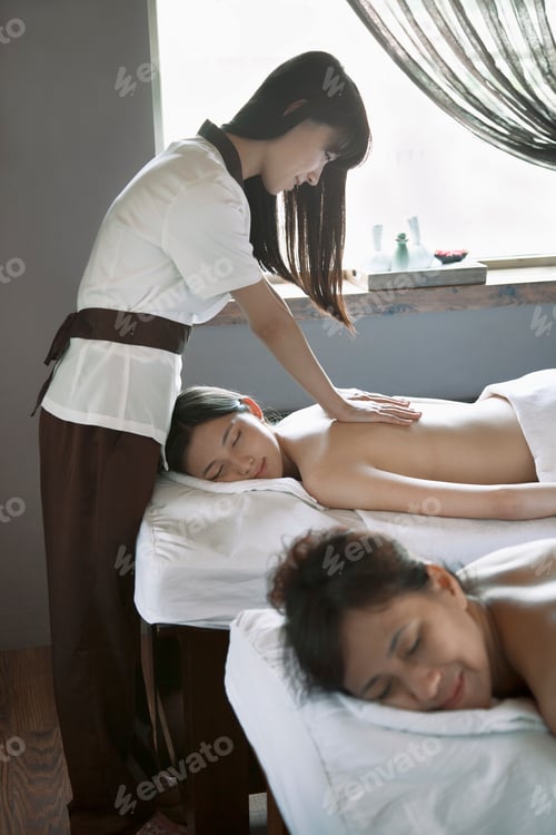 Preview: Mother and Daughter Having Back Massage Together