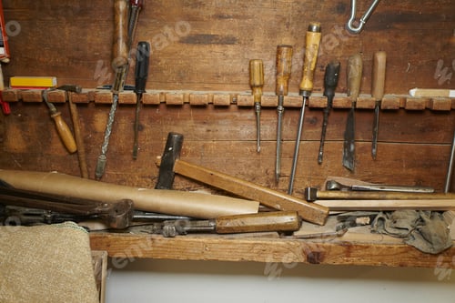 Preview: Chisels and wood on workbench
