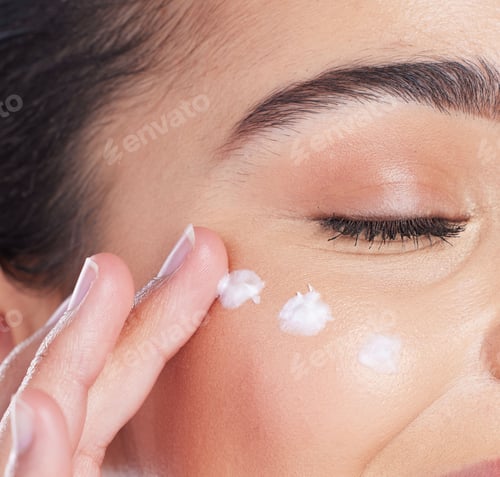 Preview: Skincare, closeup and woman with cream on face, anti ageing and collagen treatment for skin glow. D