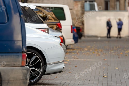 Preview: the yard of the houses of the city residential area with parked cars