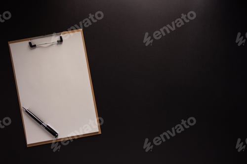 Preview: Clipboard and paper on black background texture. Creative idea concept