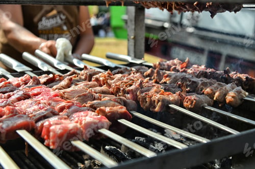 Preview: Typical Italian barbeque meal called bombette at a street food fair in Turin, Italy